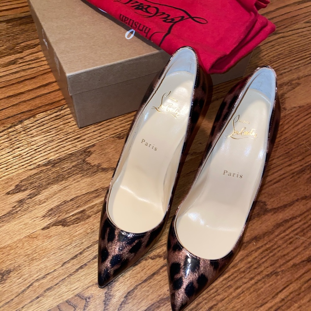 Christian Louboutin Pigalle Follies Leo pumps.